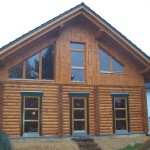 Holzhaus-Rundbohlen-Rundbalken-Wohnhaus-werdau1